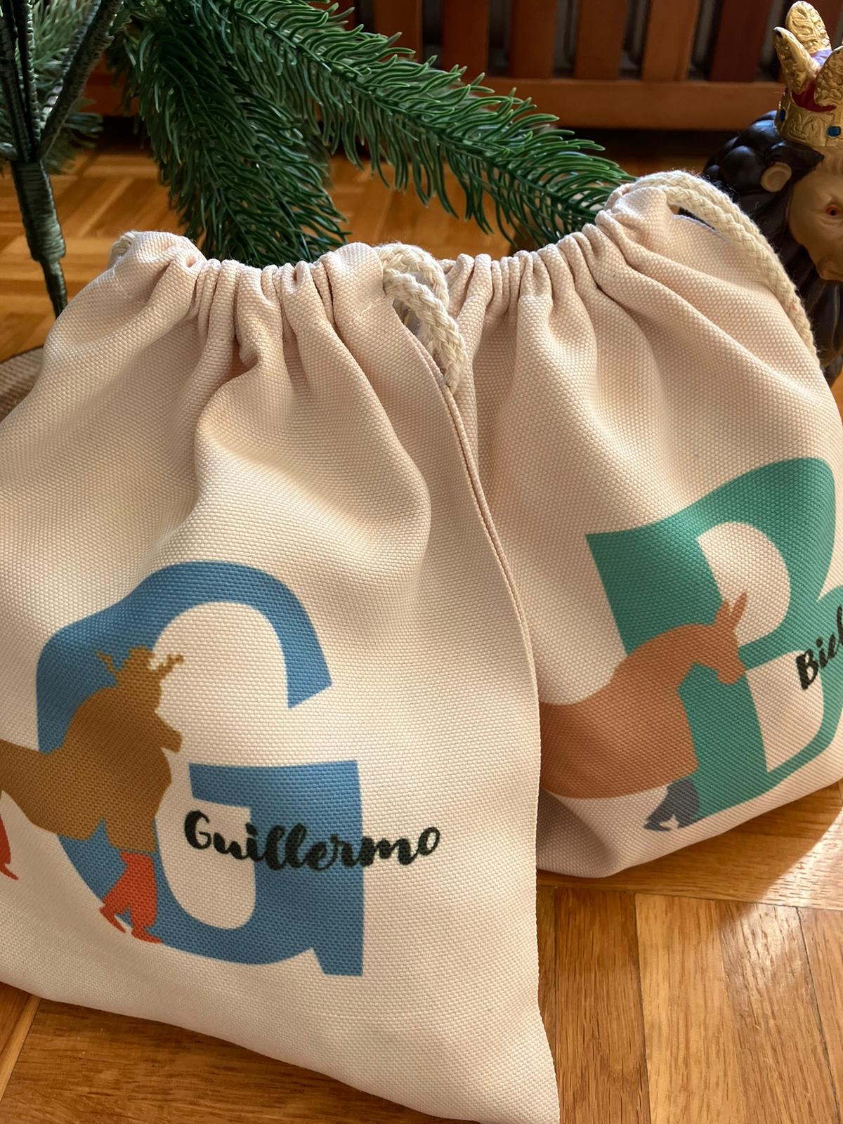 Bossa amb inicial i element del seguici Popular de Tarragona