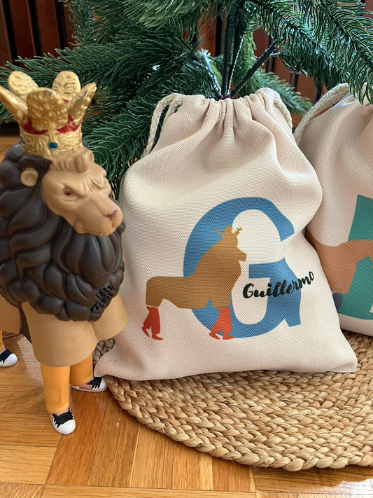 Bossa amb inicial i element del seguici Popular de Tarragona